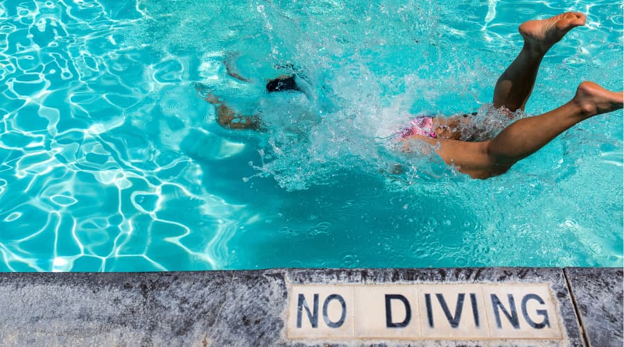Sporting Injuries for Chiropractor - Diving into Pool - Tunbridge Wells Chiropractic Clinic